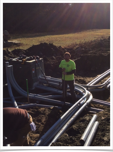 commercial electrical contractor working on an exterior electrical junction box